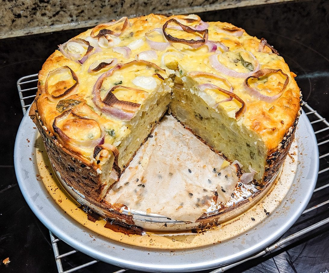 Cheesy cauliflower cake with bacon crumble